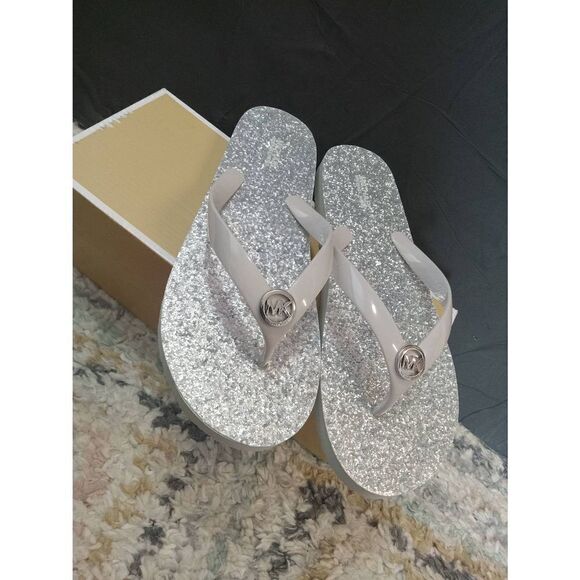 NEW NO B0X SILVER MK flip flops 10